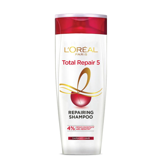 A white and red bottle of Sparkling Fusion L'Oreal Paris Shampoo for Damaged and Weak Hair, with Pro-Keratin + Ceramide, Total Repair 5, is displayed. The bottle features a red cap and showcases a graphic of a red sphere tied with a gold ribbon. Text on the bottle indicates it contains 4% repair concentrate with keratin for damaged hair.