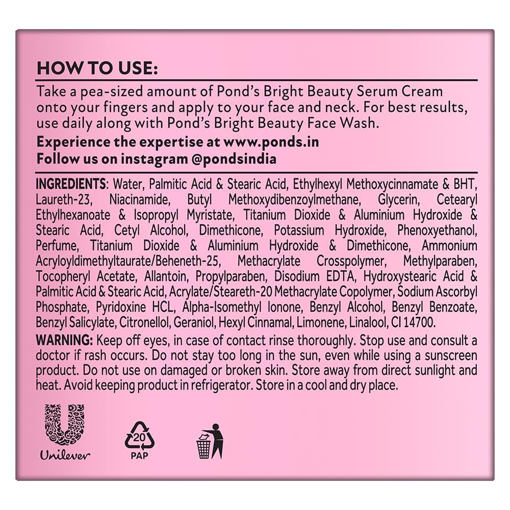 The image is a close-up of the back of a Sparkling Fusion POND'S Bright Beauty Day Cream 24 g package. There are instructions on how to use the product, a list of ingredients, including Niacinamide and Pro-vitamin B3, and cautionary notes. The text is in English and the pink packaging features several logos at the bottom.